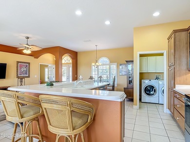 Listed BELOW APPRAISED VALUE, this 3-bedroom 2-bathroom home is on LPGA International Golf Course in Florida - for sale on GolfHomes.com, golf home, golf lot