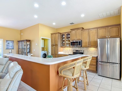 Listed BELOW APPRAISED VALUE, this 3-bedroom 2-bathroom home is on LPGA International Golf Course in Florida - for sale on GolfHomes.com, golf home, golf lot