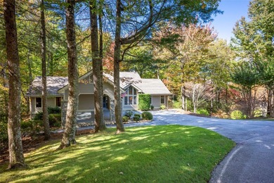 Discover easy mountain living at 242 Club Colony, a beautifully on Lake Toxaway Country Club in North Carolina - for sale on GolfHomes.com, golf home, golf lot
