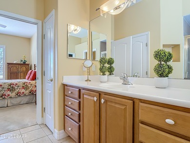 Listed BELOW APPRAISED VALUE, this 3-bedroom 2-bathroom home is on LPGA International Golf Course in Florida - for sale on GolfHomes.com, golf home, golf lot