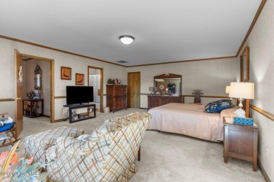 NOW AVAILABLE - GRANDIOSE, CUSTOM BUILT HOME WITH LARGE SPACES on Brandywine Bay Golf Club in North Carolina - for sale on GolfHomes.com, golf home, golf lot