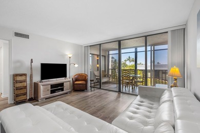 Beautifully updated 2 bedroom condo with a peak of ocean views on Ocean Village Golf Course in Florida - for sale on GolfHomes.com, golf home, golf lot