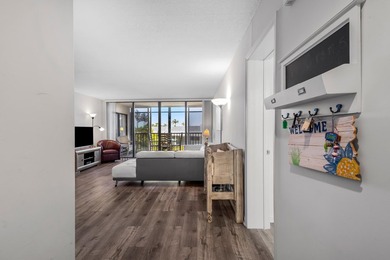 Beautifully updated 2 bedroom condo with a peak of ocean views on Ocean Village Golf Course in Florida - for sale on GolfHomes.com, golf home, golf lot