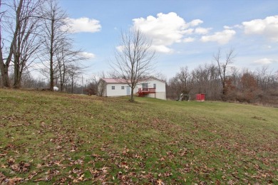 Welcome to 10291 Highland Green Drive, a 3-bedroom, 3-bath home on Lake LeAnn Golf Course in Michigan - for sale on GolfHomes.com, golf home, golf lot