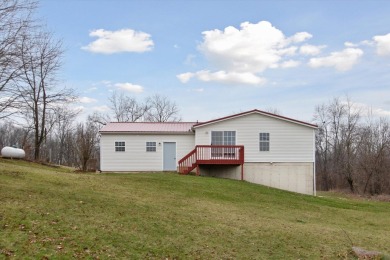 Welcome to 10291 Highland Green Drive, a 3-bedroom, 3-bath home on Lake LeAnn Golf Course in Michigan - for sale on GolfHomes.com, golf home, golf lot