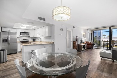 Beautifully updated 2 bedroom condo with a peak of ocean views on Ocean Village Golf Course in Florida - for sale on GolfHomes.com, golf home, golf lot