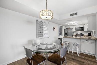 Beautifully updated 2 bedroom condo with a peak of ocean views on Ocean Village Golf Course in Florida - for sale on GolfHomes.com, golf home, golf lot