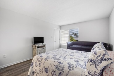 Beautifully updated 2 bedroom condo with a peak of ocean views on Ocean Village Golf Course in Florida - for sale on GolfHomes.com, golf home, golf lot