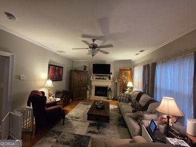 Welcome to this beautifully maintained all-brick home, ideally on Canongate At Georgia National Golf Club in Georgia - for sale on GolfHomes.com, golf home, golf lot