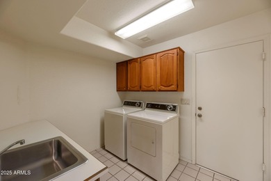 This stunning home shines inside and out, spanning over 2,207 on Westbrook Village Golf Club in Arizona - for sale on GolfHomes.com, golf home, golf lot