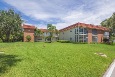 Live the Floirda lifestyle in this stunning 2 Bed/ 2 bath, fully on The American Golf Club in Florida - for sale on GolfHomes.com, golf home, golf lot