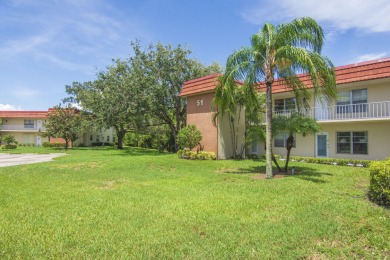 Live the Floirda lifestyle in this stunning 2 Bed/ 2 bath, fully on The American Golf Club in Florida - for sale on GolfHomes.com, golf home, golf lot