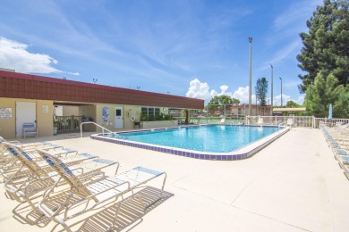 Live the Floirda lifestyle in this stunning 2 Bed/ 2 bath, fully on The American Golf Club in Florida - for sale on GolfHomes.com, golf home, golf lot