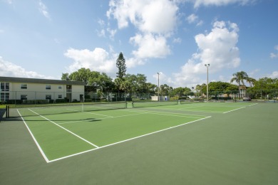 Live the Floirda lifestyle in this stunning 2 Bed/ 2 bath, fully on The American Golf Club in Florida - for sale on GolfHomes.com, golf home, golf lot