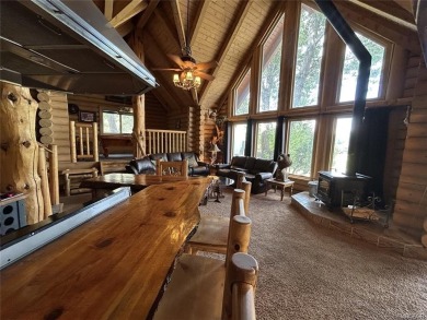 Beautiful 3-bedroom, 2-bath true full log cabin located directly on Big Bear Mountain Ski and Golf Resort in California - for sale on GolfHomes.com, golf home, golf lot