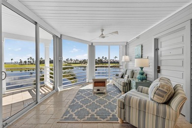Morning light floods the beautiful window lined sunroom of this on Captiva Island Golf Club in Florida - for sale on GolfHomes.com, golf home, golf lot