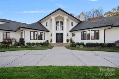 Experience luxury living at 18730 Peninsula Club Drive in the on The Peninsula Club in North Carolina - for sale on GolfHomes.com, golf home, golf lot