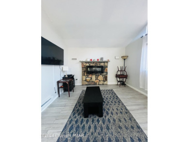 Come check out this UPDATED COZY CHALET/Raised Ranch with a on Pocono Farms Country Club in Pennsylvania - for sale on GolfHomes.com, golf home, golf lot