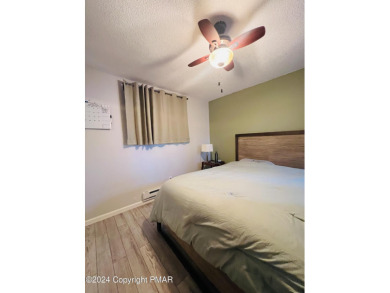 Come check out this UPDATED COZY CHALET/Raised Ranch with a on Pocono Farms Country Club in Pennsylvania - for sale on GolfHomes.com, golf home, golf lot