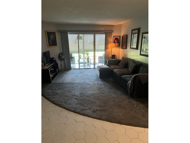 3755 Via Poinciana unit: 203 on Poinciana Golf Club in Florida - for sale on GolfHomes.com, golf home, golf lot