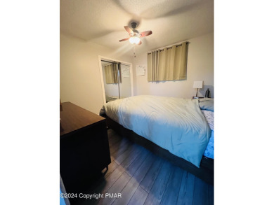 Come check out this UPDATED COZY CHALET/Raised Ranch with a on Pocono Farms Country Club in Pennsylvania - for sale on GolfHomes.com, golf home, golf lot