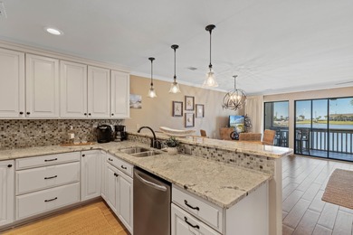 Beautiful 3-bedroom, 3-bath lakefront condo in the Boardwalk on Seascape Golf Course in Florida - for sale on GolfHomes.com, golf home, golf lot