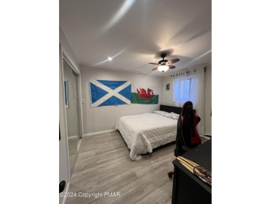 Come check out this UPDATED COZY CHALET/Raised Ranch with a on Pocono Farms Country Club in Pennsylvania - for sale on GolfHomes.com, golf home, golf lot