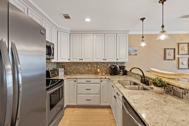 Beautiful 3-bedroom, 3-bath lakefront condo in the Boardwalk on Seascape Golf Course in Florida - for sale on GolfHomes.com, golf home, golf lot