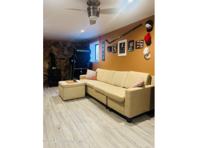 Come check out this UPDATED COZY CHALET/Raised Ranch with a on Pocono Farms Country Club in Pennsylvania - for sale on GolfHomes.com, golf home, golf lot