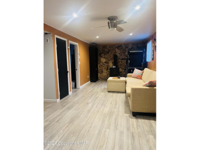 Come check out this UPDATED COZY CHALET/Raised Ranch with a on Pocono Farms Country Club in Pennsylvania - for sale on GolfHomes.com, golf home, golf lot