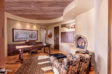 Set within the gated enclave of Pinnacle Canyon at Troon North on Troon North Golf Club  in Arizona - for sale on GolfHomes.com, golf home, golf lot