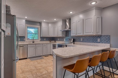 Welcome to this beautifully maintained 5-bedroom, 3.5-bathroom on Henderson Country Club in Kentucky - for sale on GolfHomes.com, golf home, golf lot