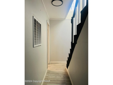 Come check out this UPDATED COZY CHALET/Raised Ranch with a on Pocono Farms Country Club in Pennsylvania - for sale on GolfHomes.com, golf home, golf lot