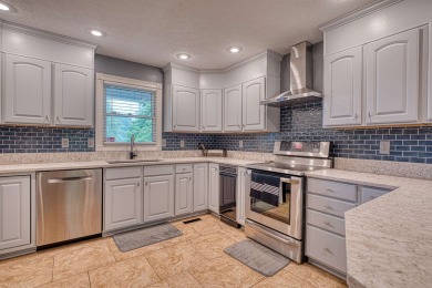 Welcome to this beautifully maintained 5-bedroom, 3.5-bathroom on Henderson Country Club in Kentucky - for sale on GolfHomes.com, golf home, golf lot