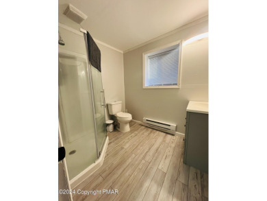 Come check out this UPDATED COZY CHALET/Raised Ranch with a on Pocono Farms Country Club in Pennsylvania - for sale on GolfHomes.com, golf home, golf lot