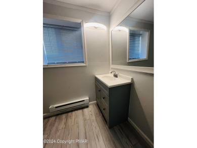 Come check out this UPDATED COZY CHALET/Raised Ranch with a on Pocono Farms Country Club in Pennsylvania - for sale on GolfHomes.com, golf home, golf lot