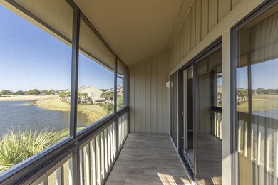 Beautiful 3-bedroom, 3-bath lakefront condo in the Boardwalk on Seascape Golf Course in Florida - for sale on GolfHomes.com, golf home, golf lot