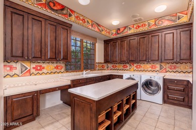 Set within the gated enclave of Pinnacle Canyon at Troon North on Troon North Golf Club  in Arizona - for sale on GolfHomes.com, golf home, golf lot