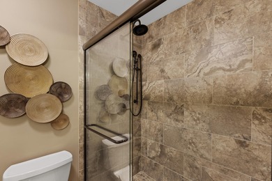 Beautiful 3-bedroom, 3-bath lakefront condo in the Boardwalk on Seascape Golf Course in Florida - for sale on GolfHomes.com, golf home, golf lot