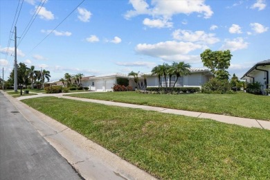Tucked away in the prestigious waterfront enclave of Dana Shores on Rocky Point Golf Course in Florida - for sale on GolfHomes.com, golf home, golf lot