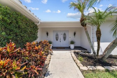 Tucked away in the prestigious waterfront enclave of Dana Shores on Rocky Point Golf Course in Florida - for sale on GolfHomes.com, golf home, golf lot