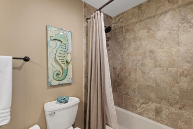 Beautiful 3-bedroom, 3-bath lakefront condo in the Boardwalk on Seascape Golf Course in Florida - for sale on GolfHomes.com, golf home, golf lot