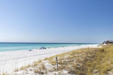 Beautiful 3-bedroom, 3-bath lakefront condo in the Boardwalk on Seascape Golf Course in Florida - for sale on GolfHomes.com, golf home, golf lot