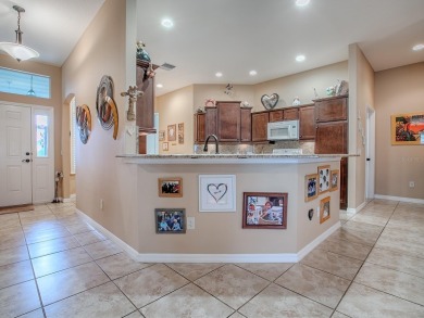 Well maintained 3 bedroom, 2 bath Designer Home with GOLF CART on Bella Glade Country Club in Florida - for sale on GolfHomes.com, golf home, golf lot