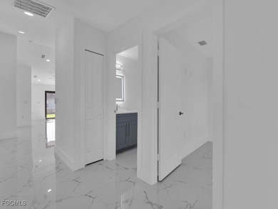 Up to $10,000 in closing cost!!! Stunning corner duplex located on Westminster Golf Club in Florida - for sale on GolfHomes.com, golf home, golf lot