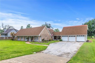 Discover this exceptional waterfront property situated on a on Bayou Oaks Country Club in Louisiana - for sale on GolfHomes.com, golf home, golf lot