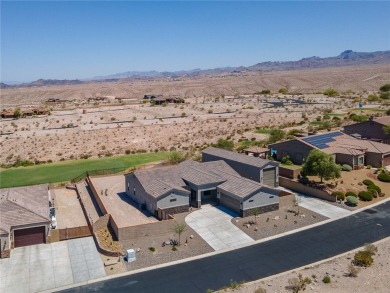 3259 Esmerelda Drive is a single-family residence that presents on Laughlin Ranch Golf Club in Arizona - for sale on GolfHomes.com, golf home, golf lot