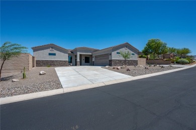 3259 Esmerelda Drive is a single-family residence that presents on Laughlin Ranch Golf Club in Arizona - for sale on GolfHomes.com, golf home, golf lot