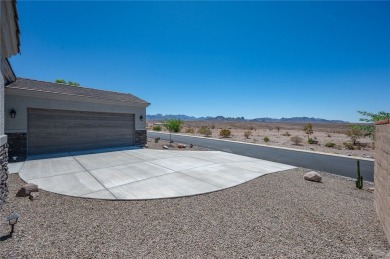 3259 Esmerelda Drive is a single-family residence that presents on Laughlin Ranch Golf Club in Arizona - for sale on GolfHomes.com, golf home, golf lot