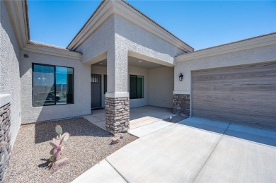 3259 Esmerelda Drive is a single-family residence that presents on Laughlin Ranch Golf Club in Arizona - for sale on GolfHomes.com, golf home, golf lot